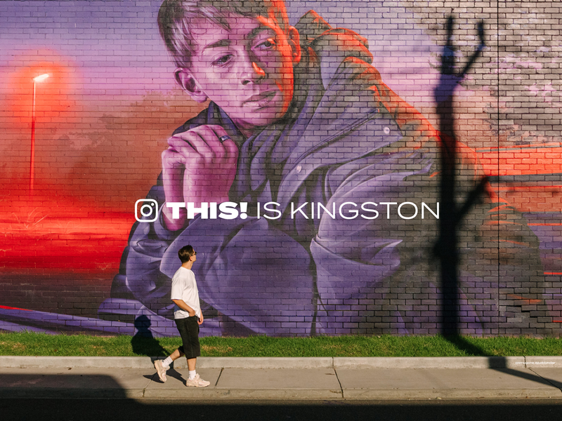 Wall with mural and THIS! Is Kingston slogan.