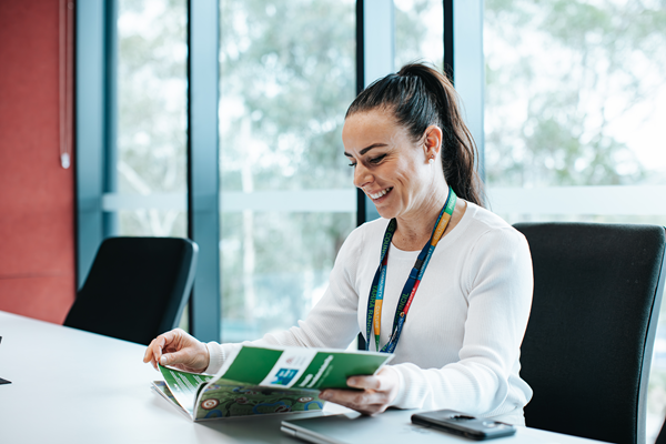 Woman reading a council report